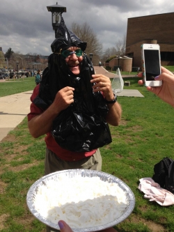 Pi Day celebration with pie in the face of faculty members